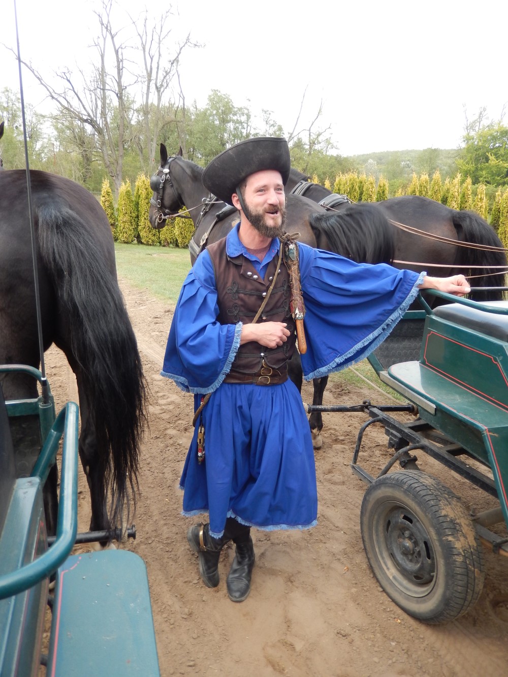 Frontiersmen next to horse & buggy