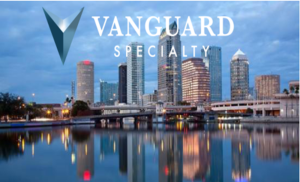 Vanguard Specialty Logo and City Background